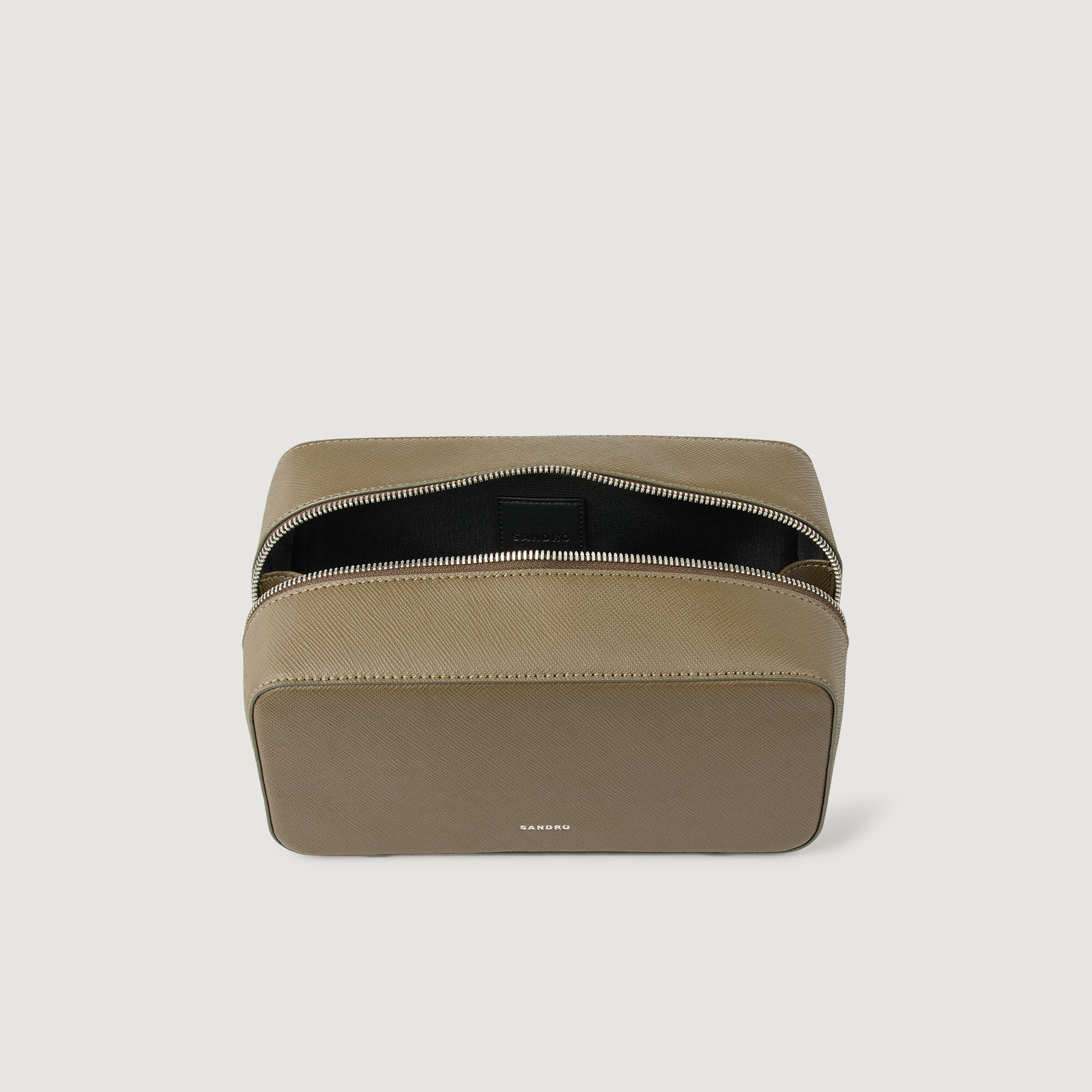 Toilet bag in reconstituted leather