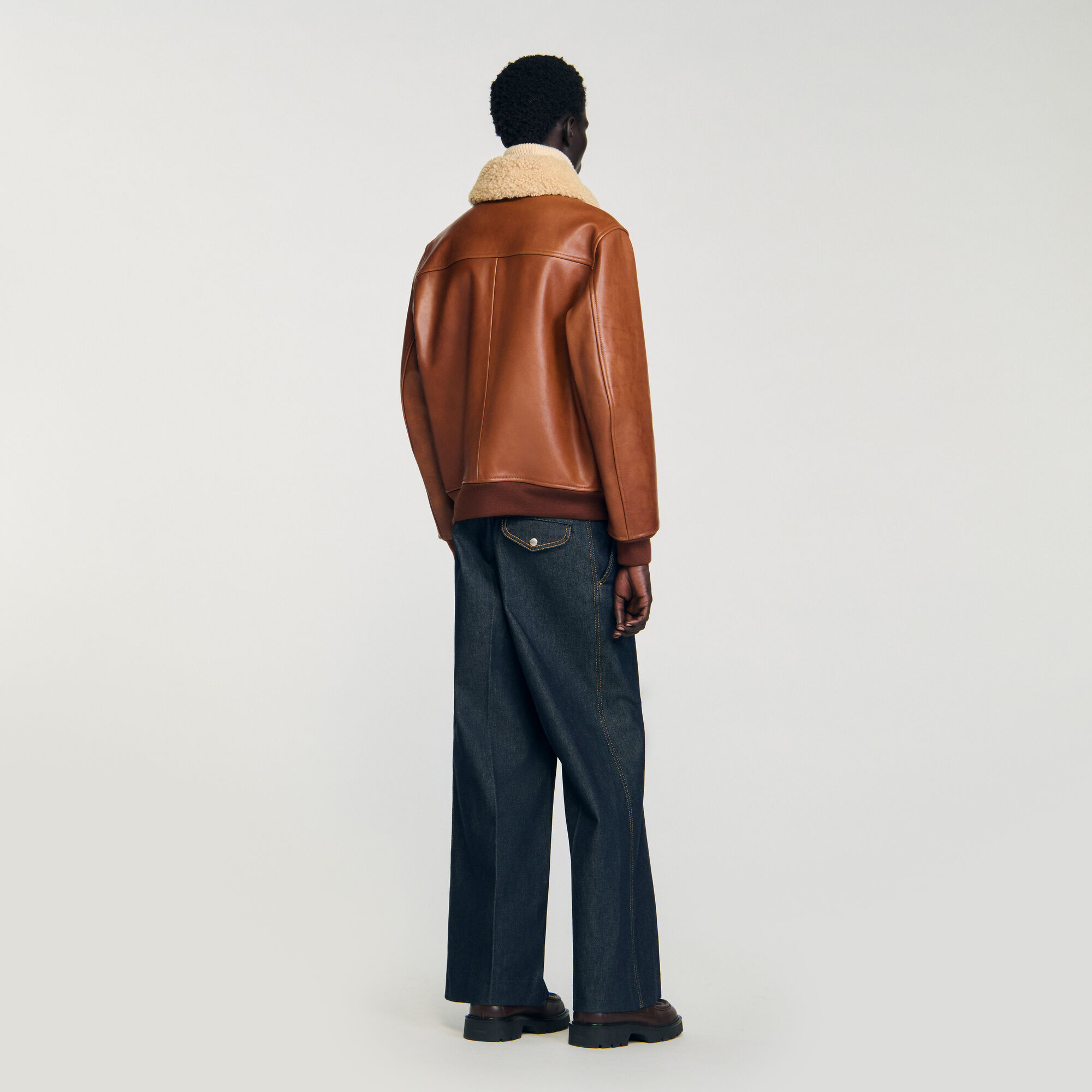 Leather jacket with fur collar