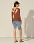Sweater with twist and ring at the back