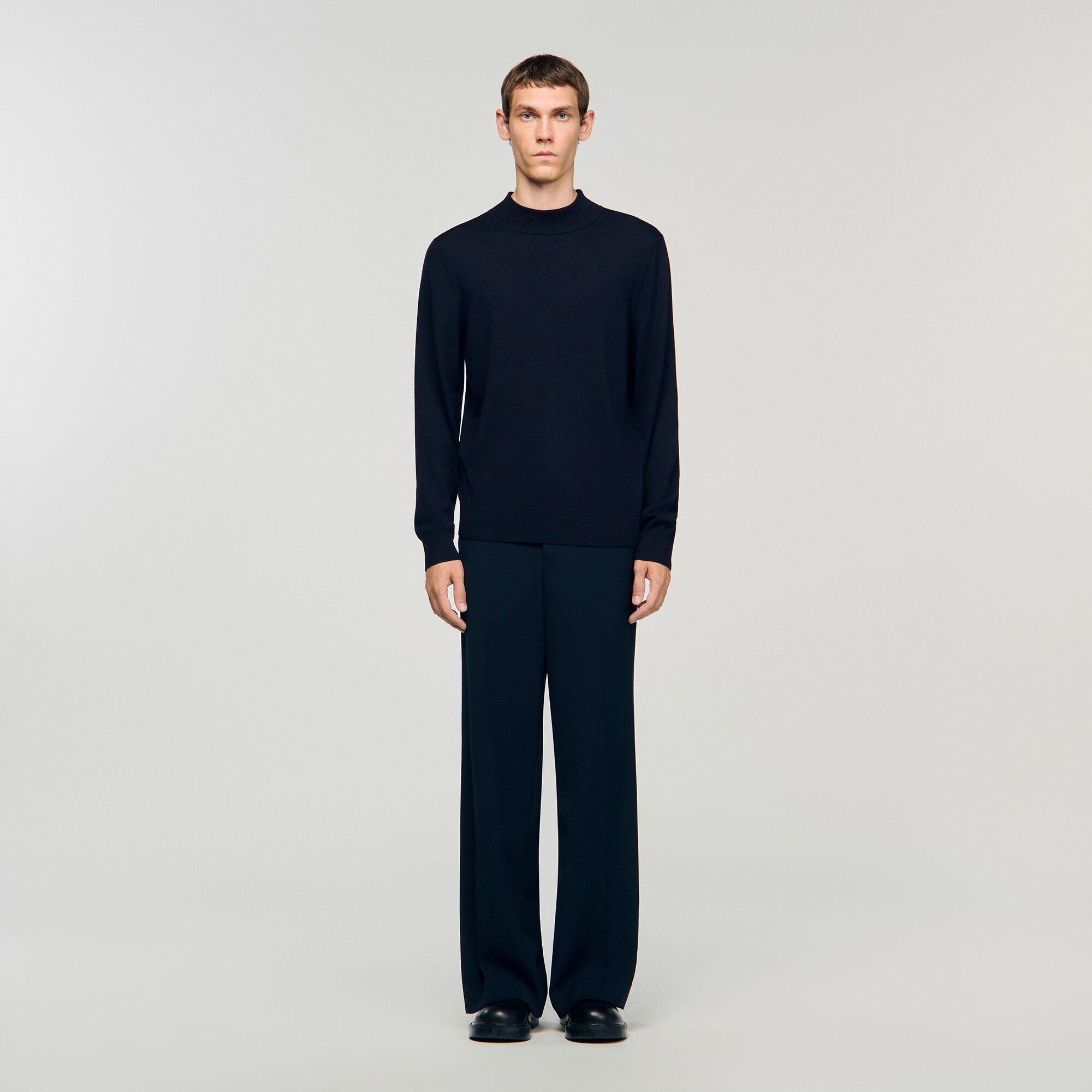 Wool jumper with a high collar