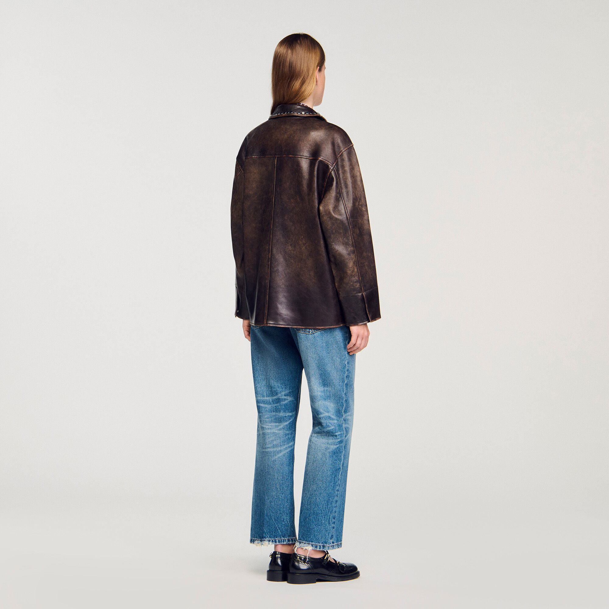 Oversized leather jacket with studs