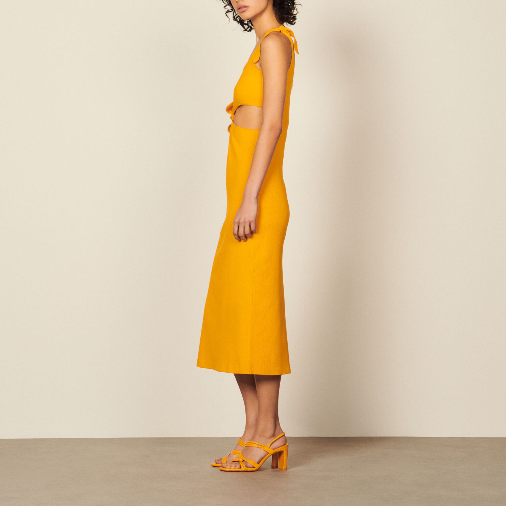 Midi dress with openwork on the sides