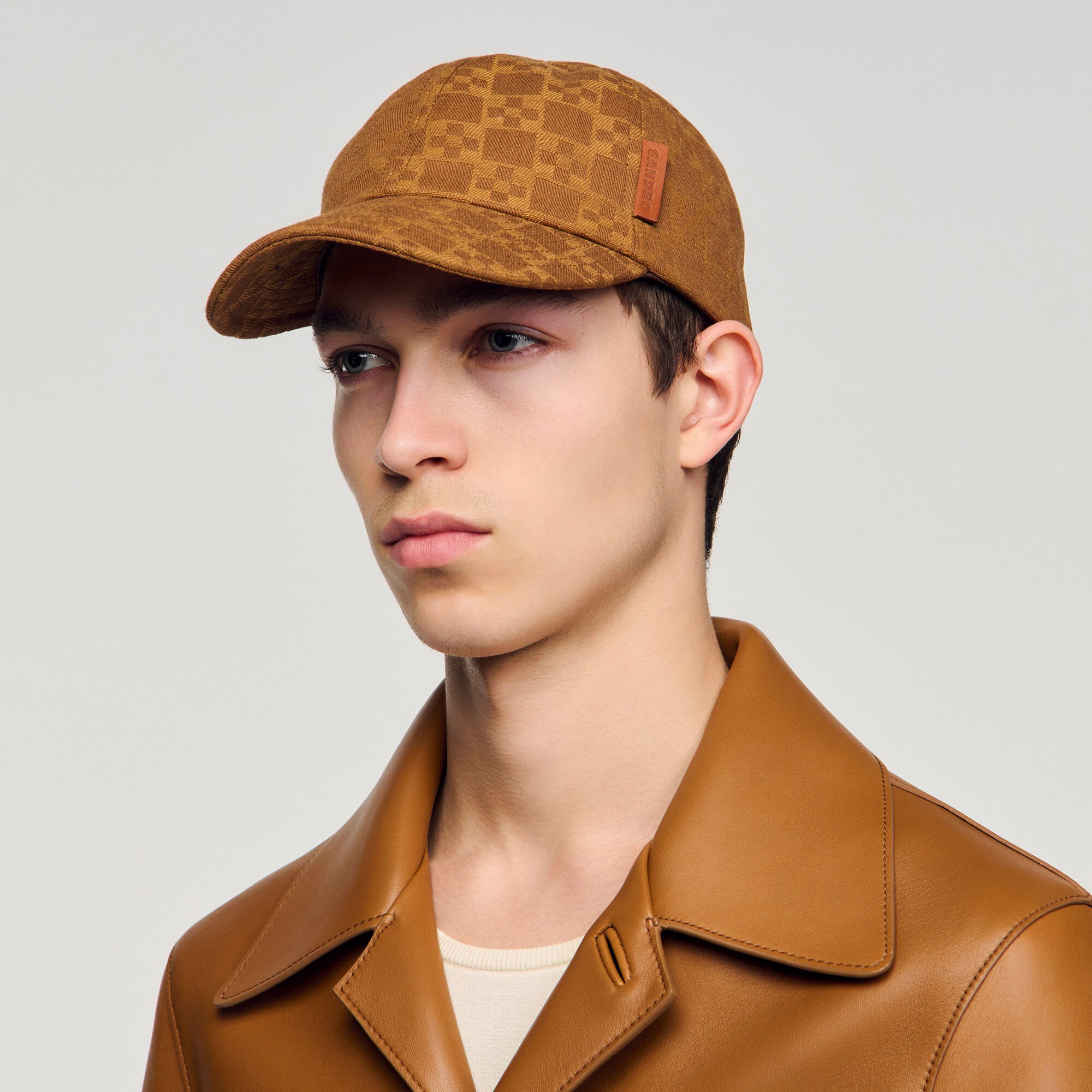 Denim cap with cross motif