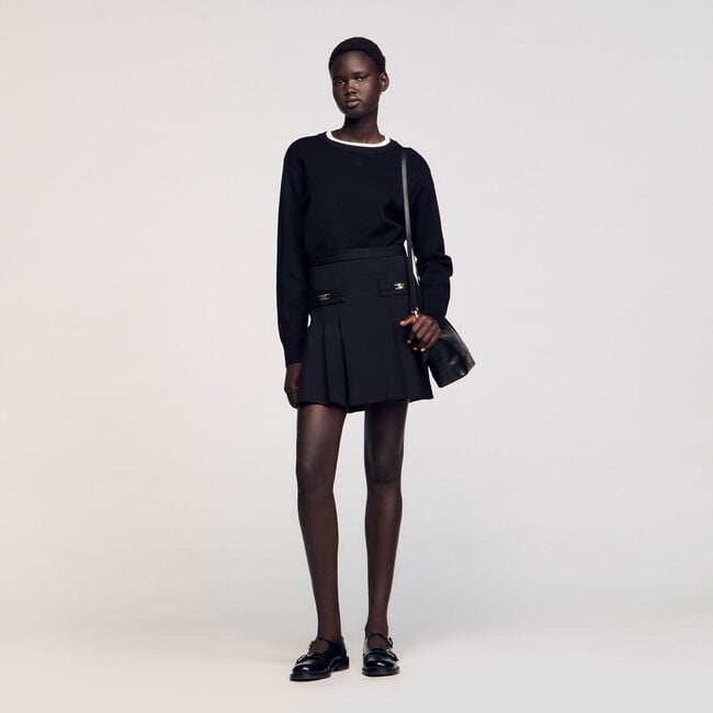 Short skirt with stitched pleats