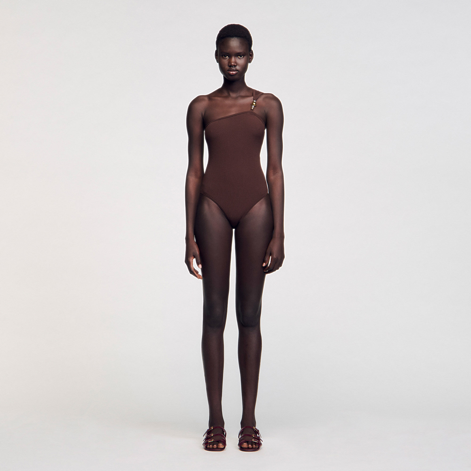 Asymmetric leotard with bead detail