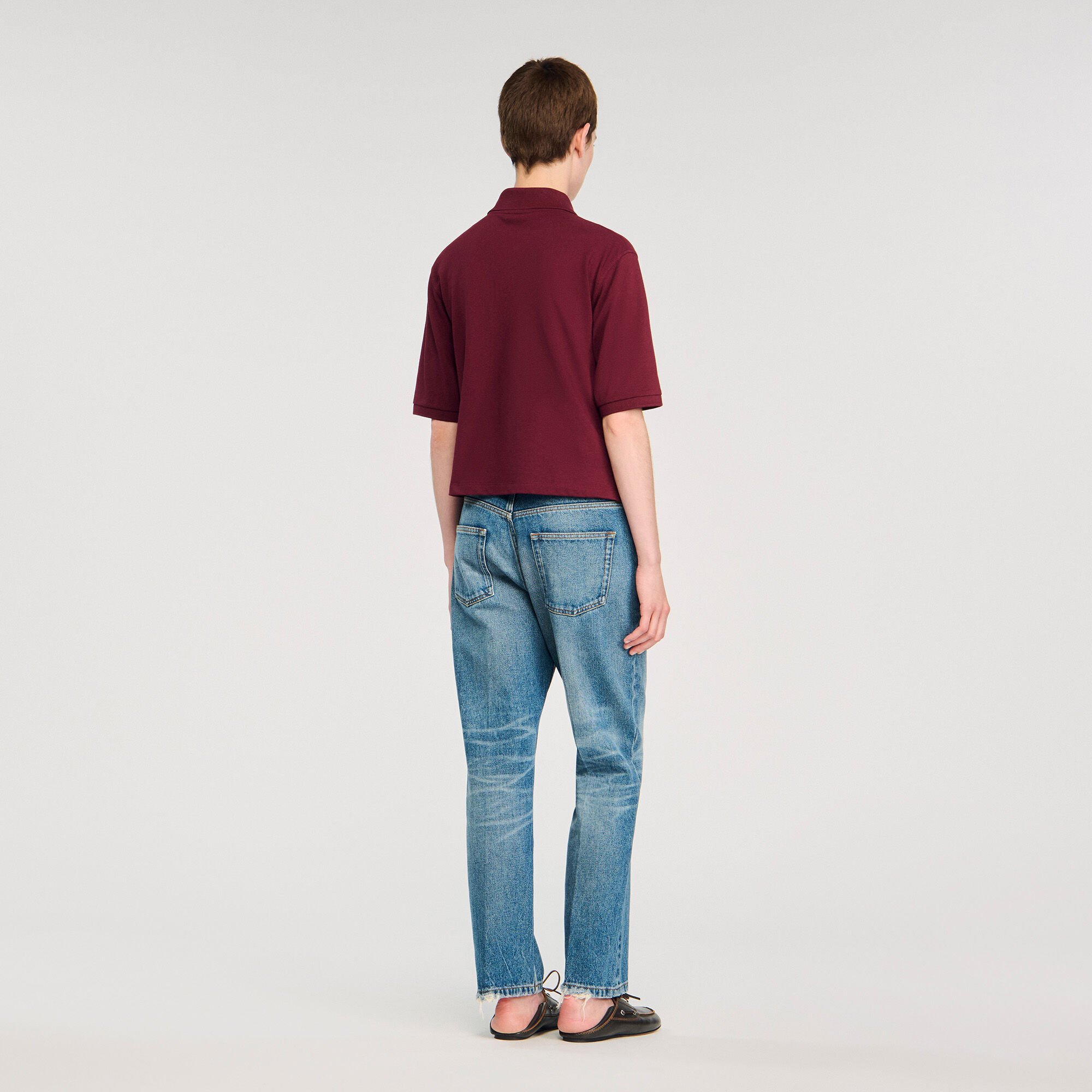 Polo shirt with decorative buttons