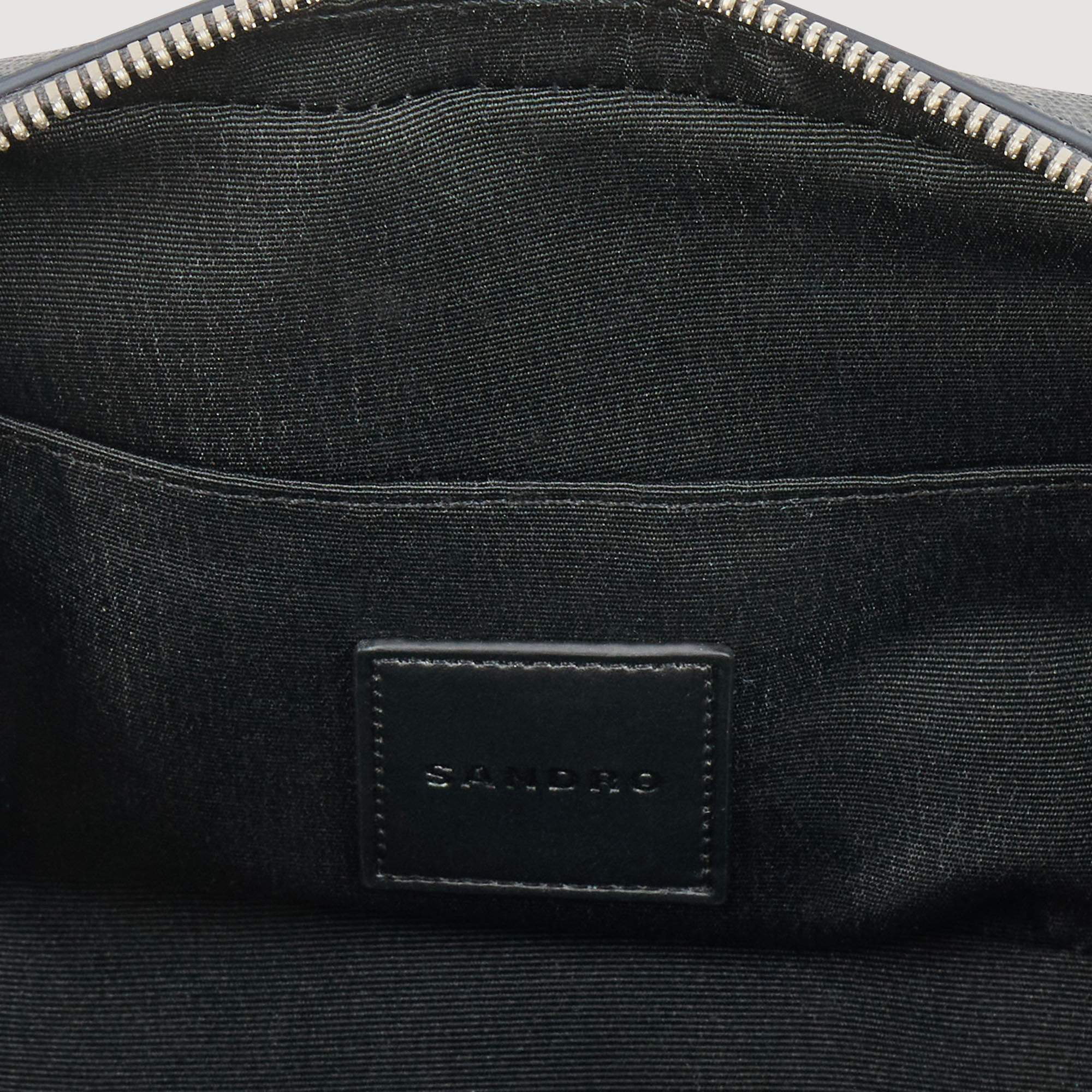 Small reconstitued leather bag