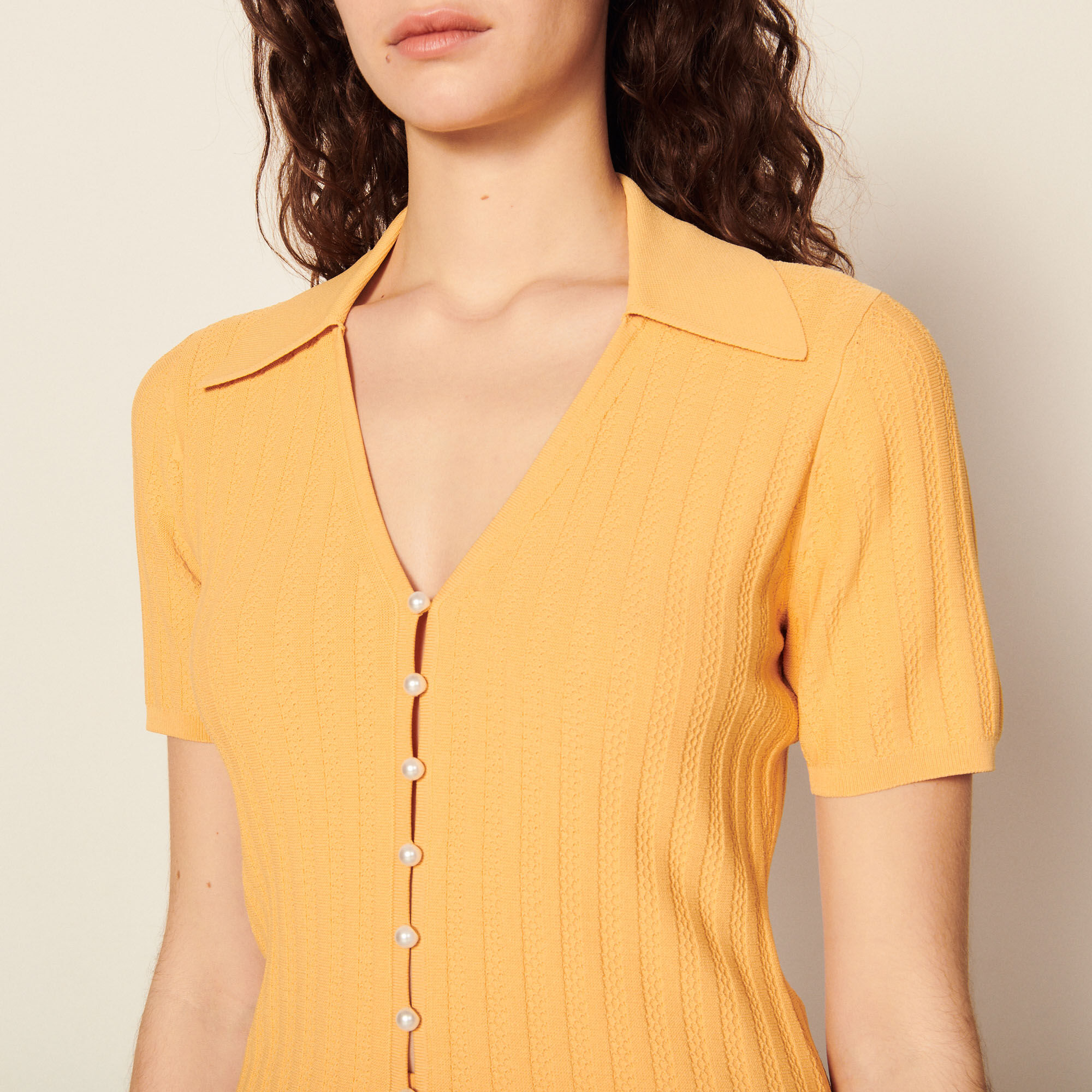 Knit top with pearl buttons