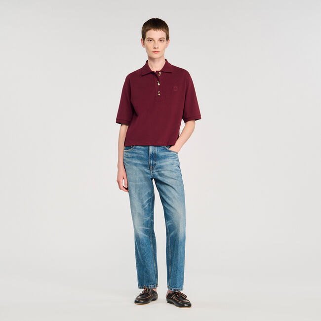 Polo shirt with decorative buttons
