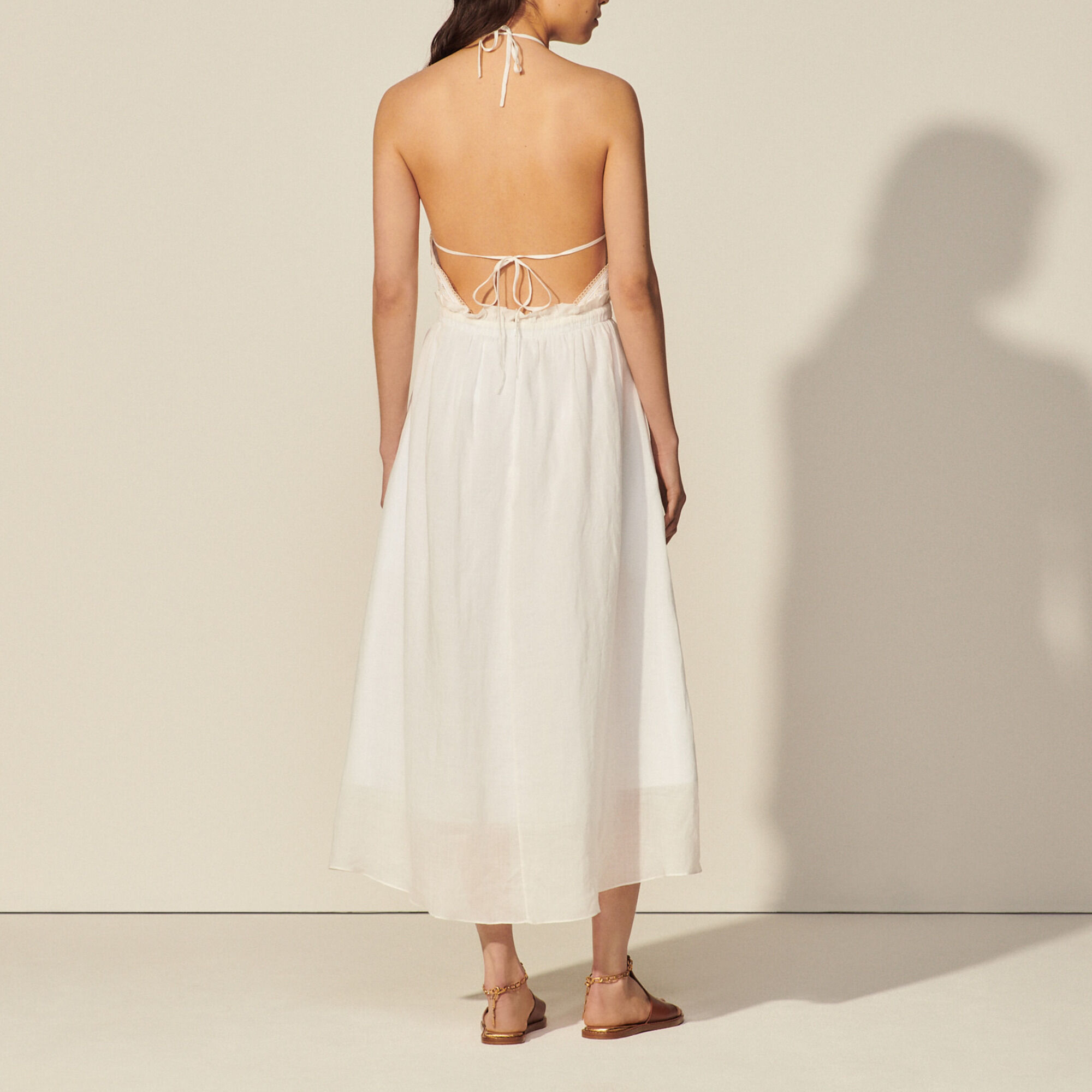 Long backless dress and lace trim