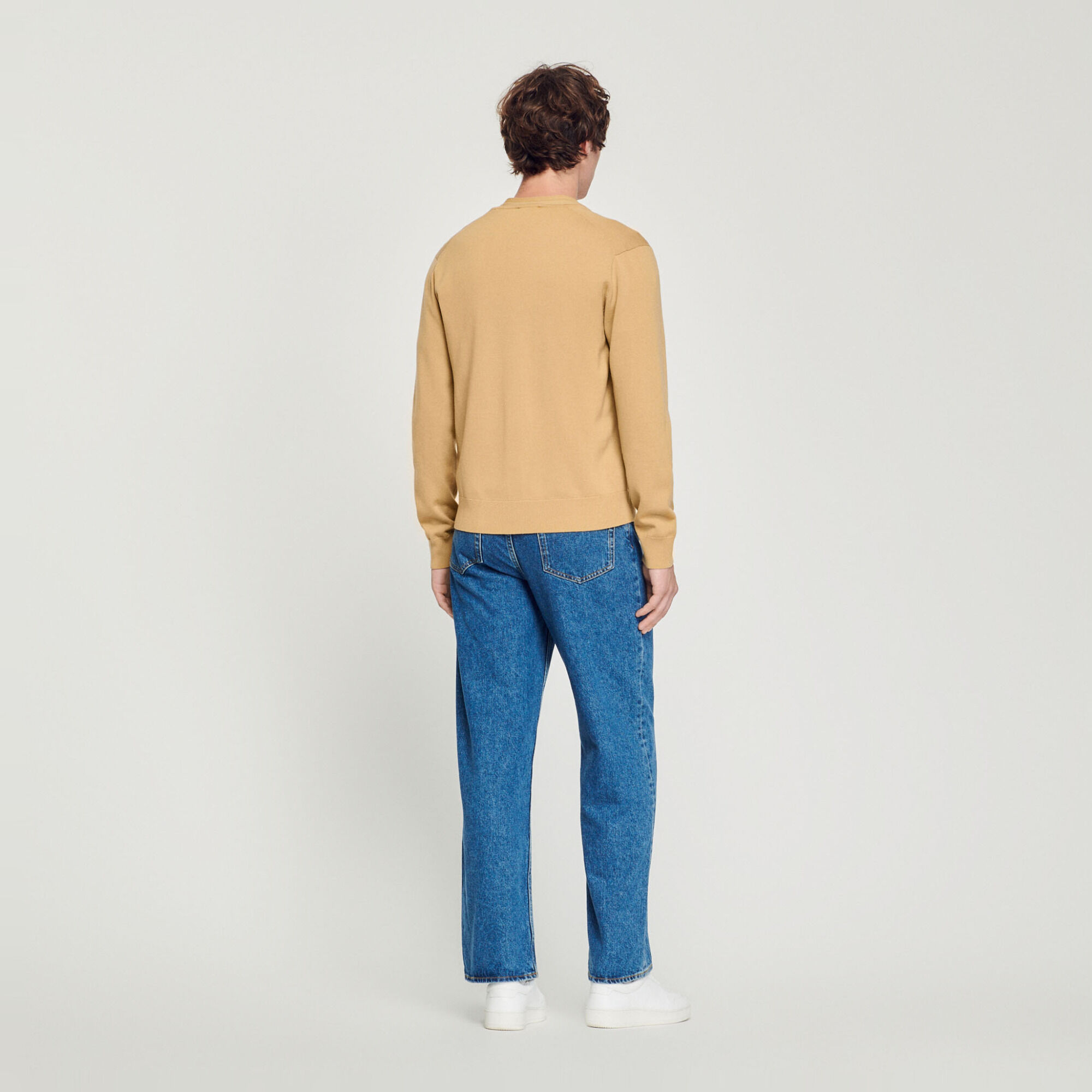 Wool cardigan with S patch
