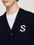 Wool cardigan with S patch