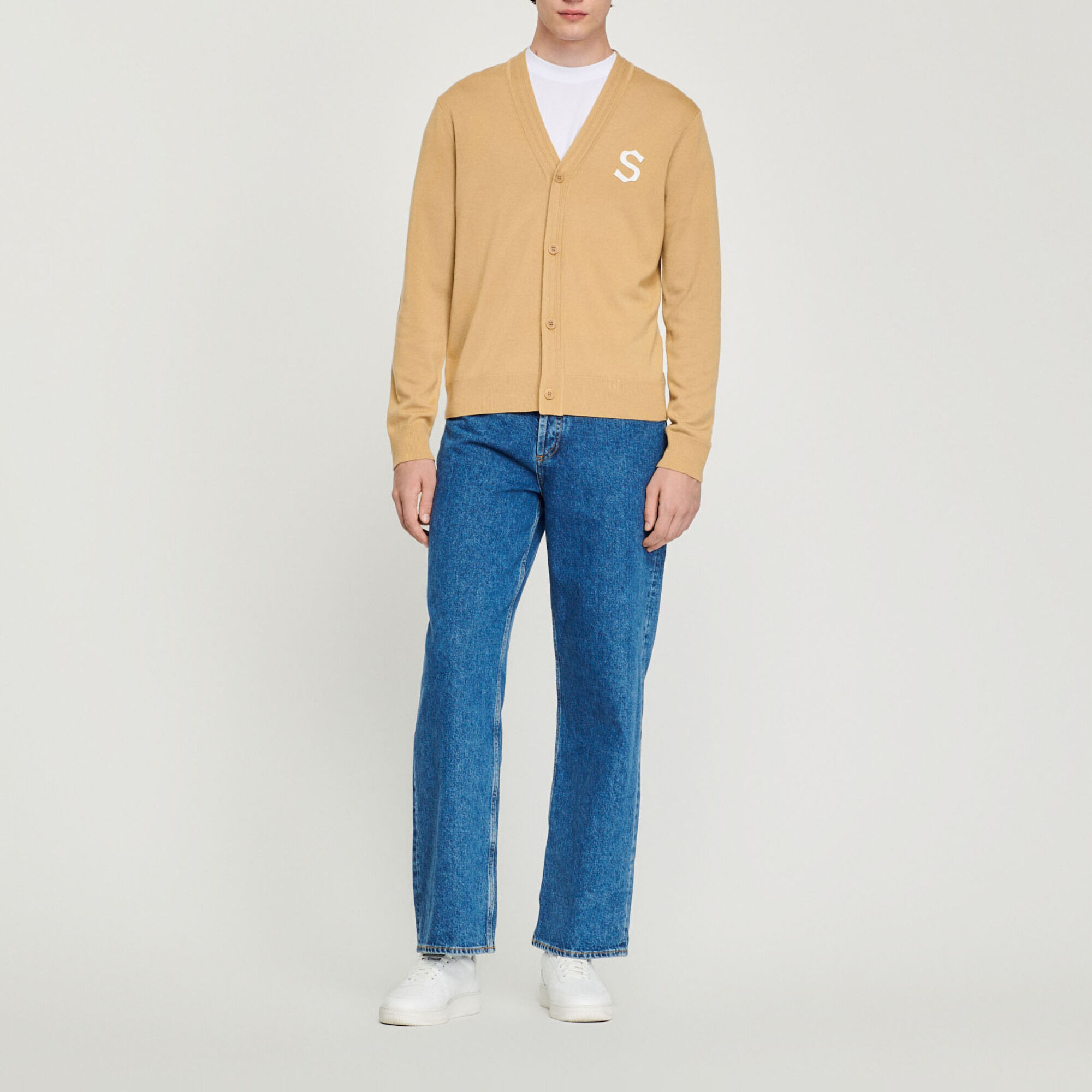 Wool cardigan with S patch