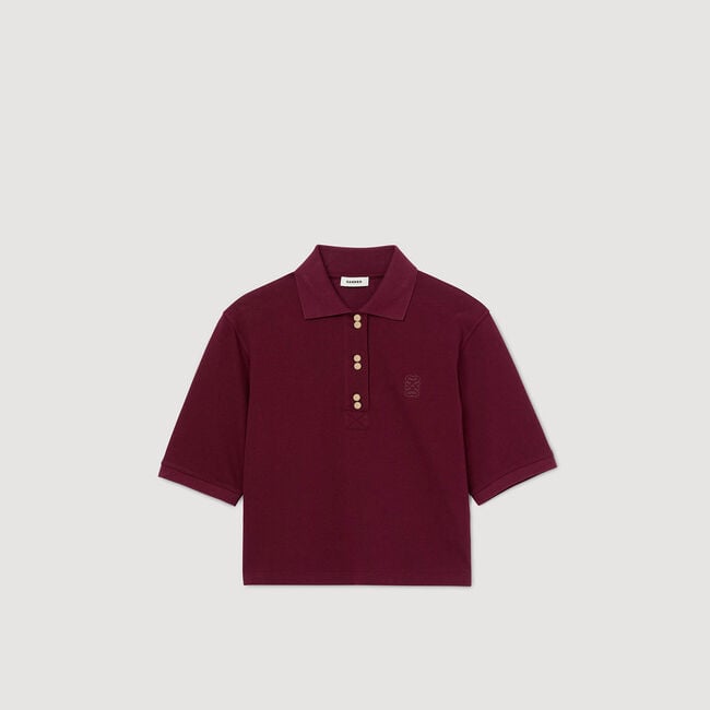 Polo shirt with decorative buttons