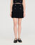 Short pleated knit skirt
