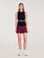 Short two-tone pleated skirt