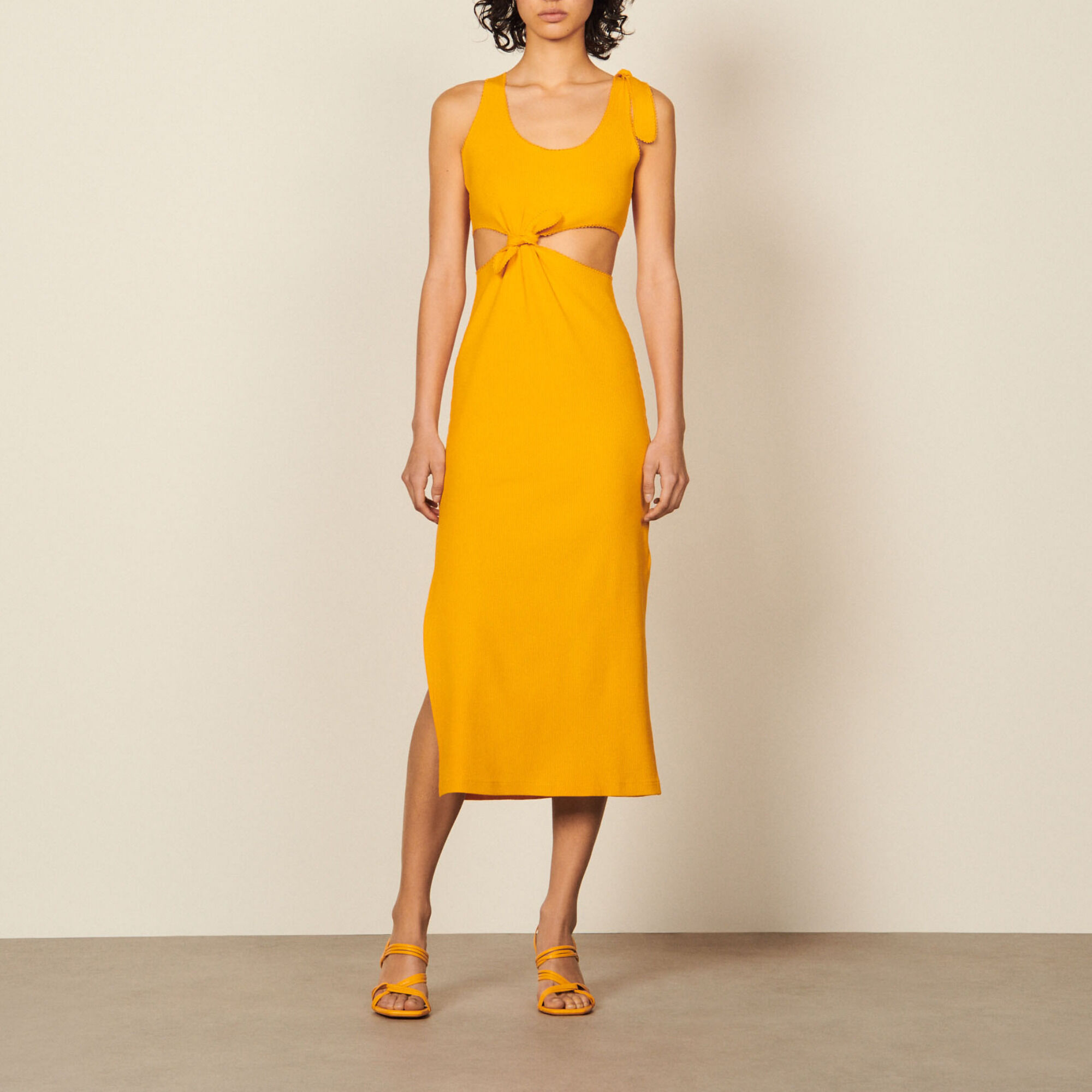 Midi dress with openwork on the sides