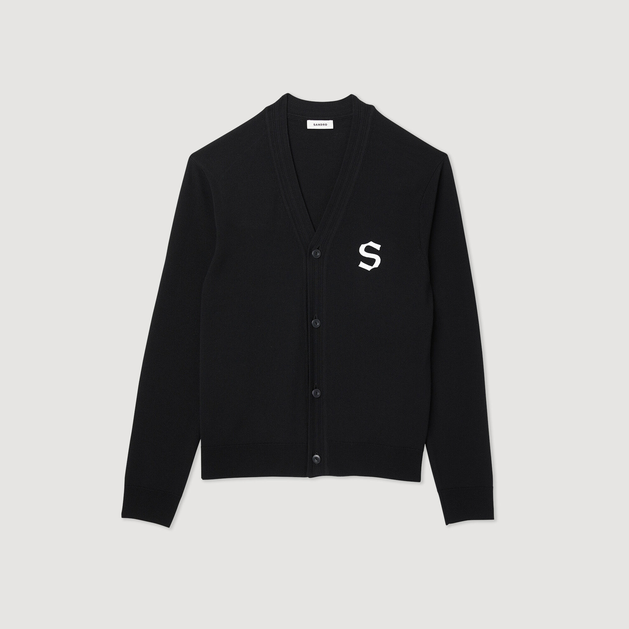 Wool cardigan with S patch