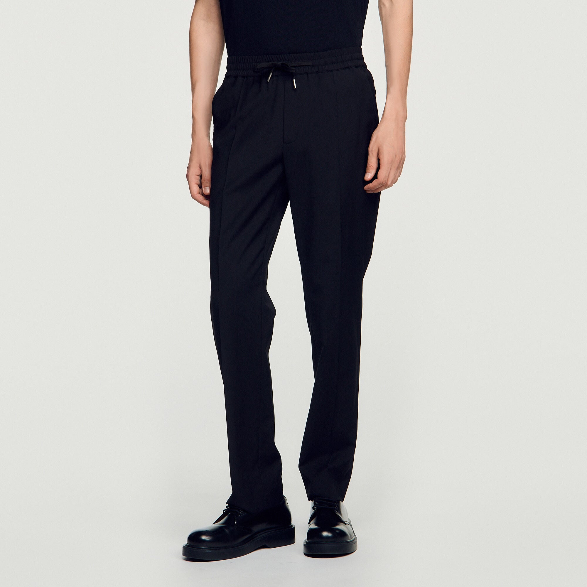 Elasticated straight-leg trousers - Men | Sandro