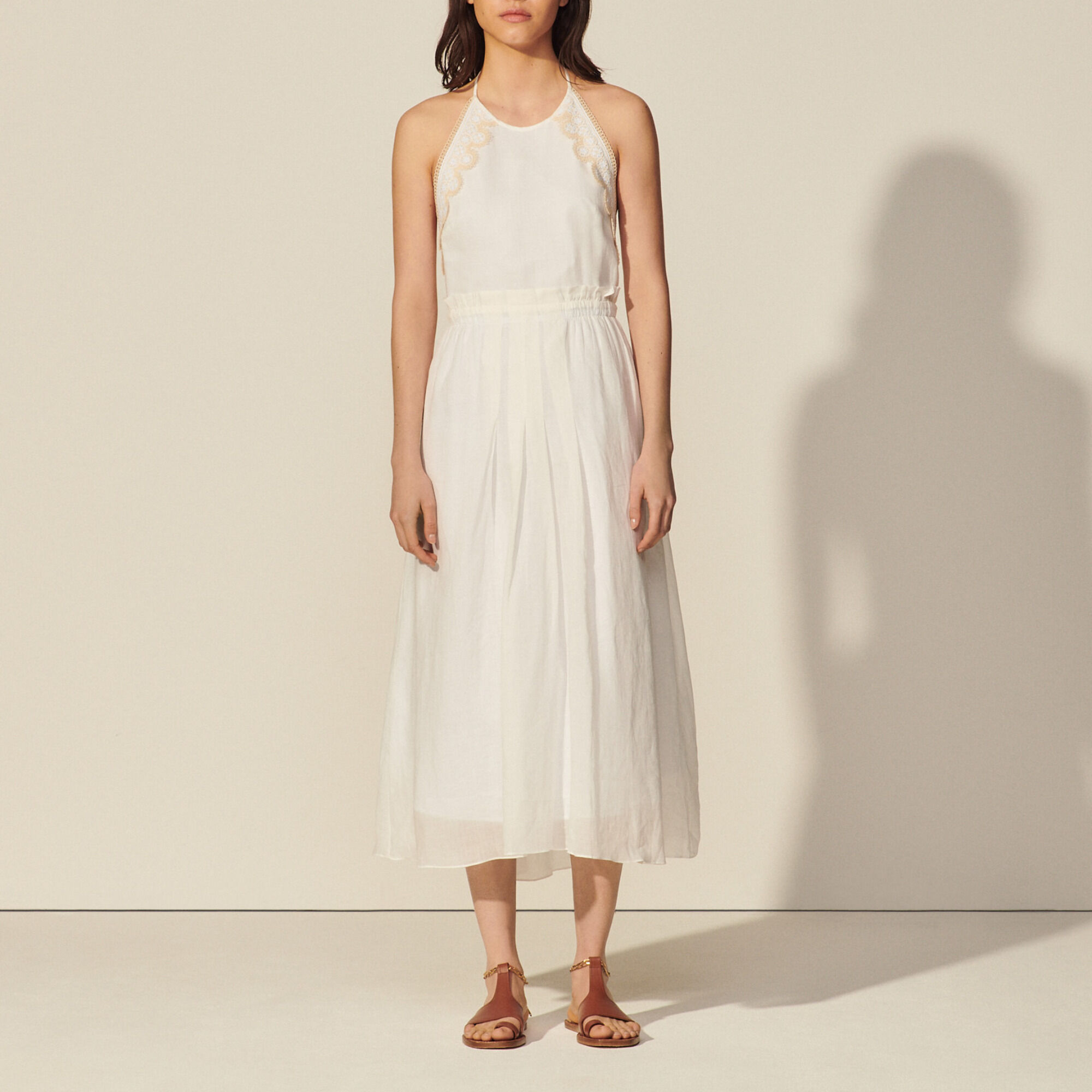 Long backless dress and lace trim