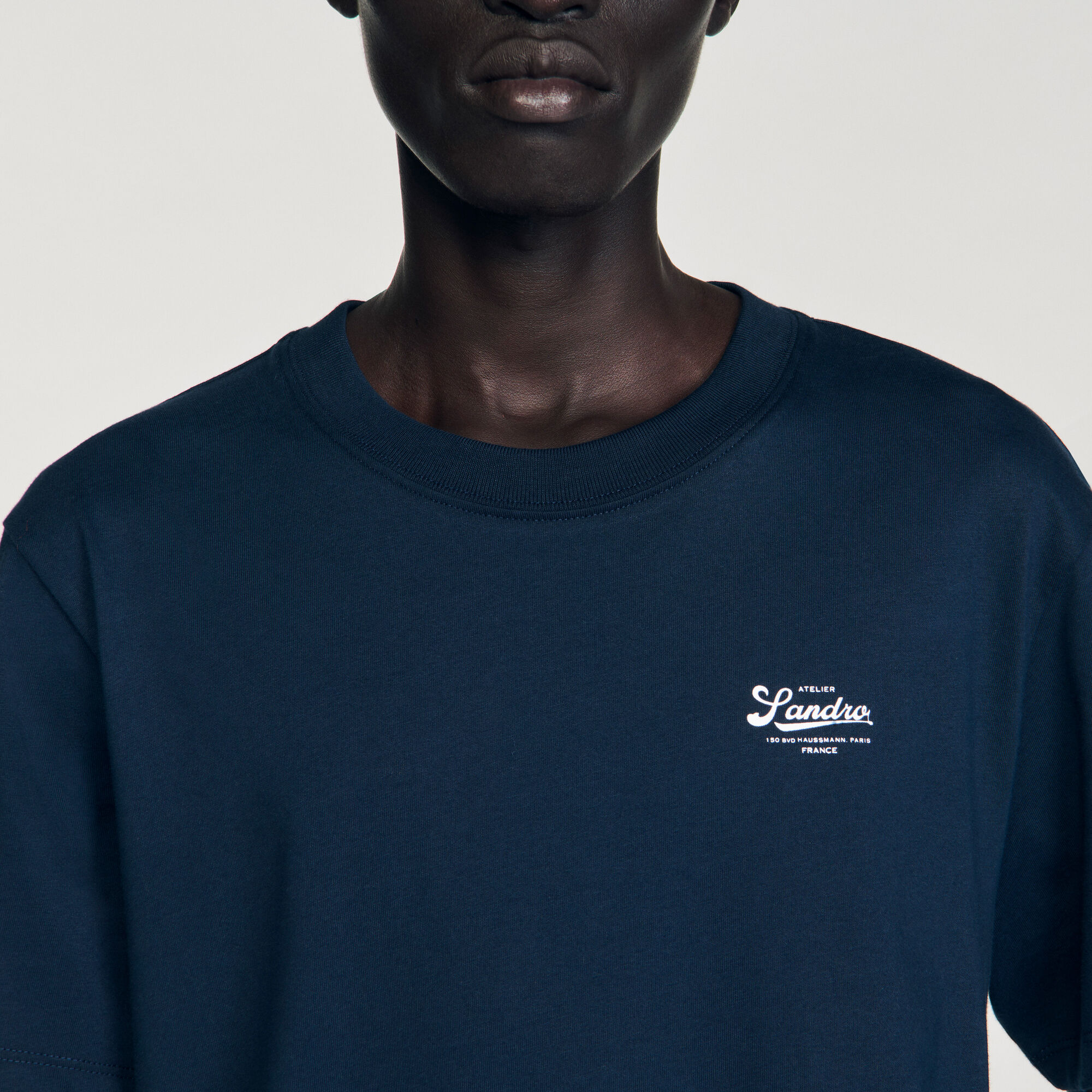 T-shirt with appliqué logo