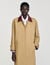 Trench coat with leather collar