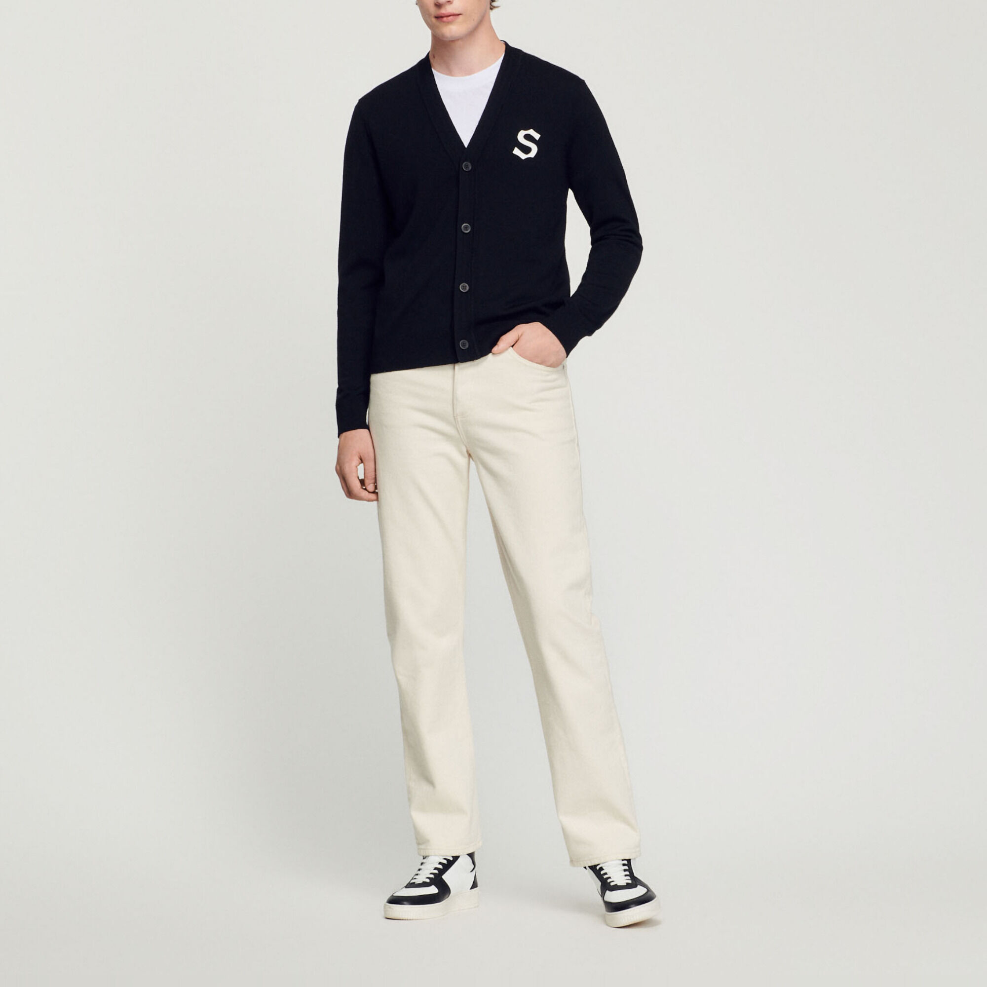 Wool cardigan with S patch