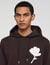 Sweatshirt with flower patch