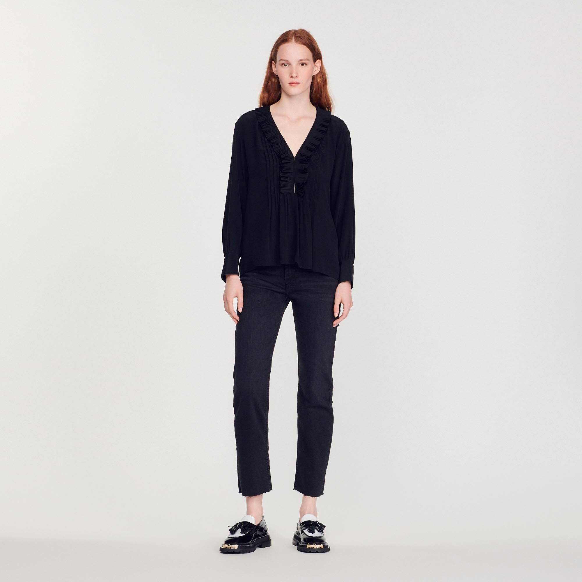 Silk top with pleat edged neckline
