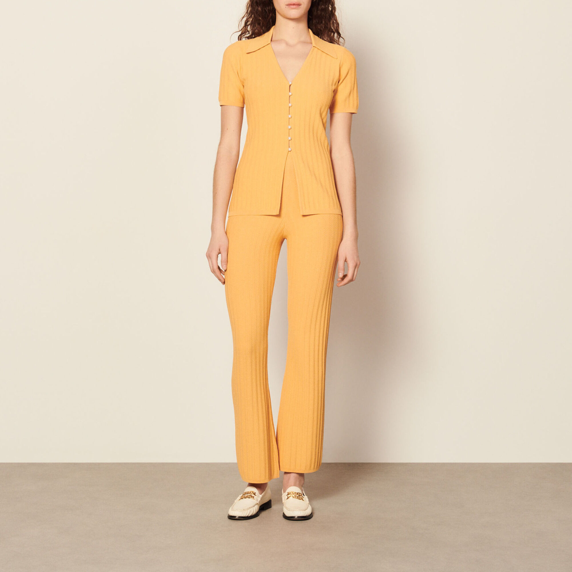 Knit top with pearl buttons