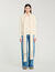 Knitted jumper with scarf collar