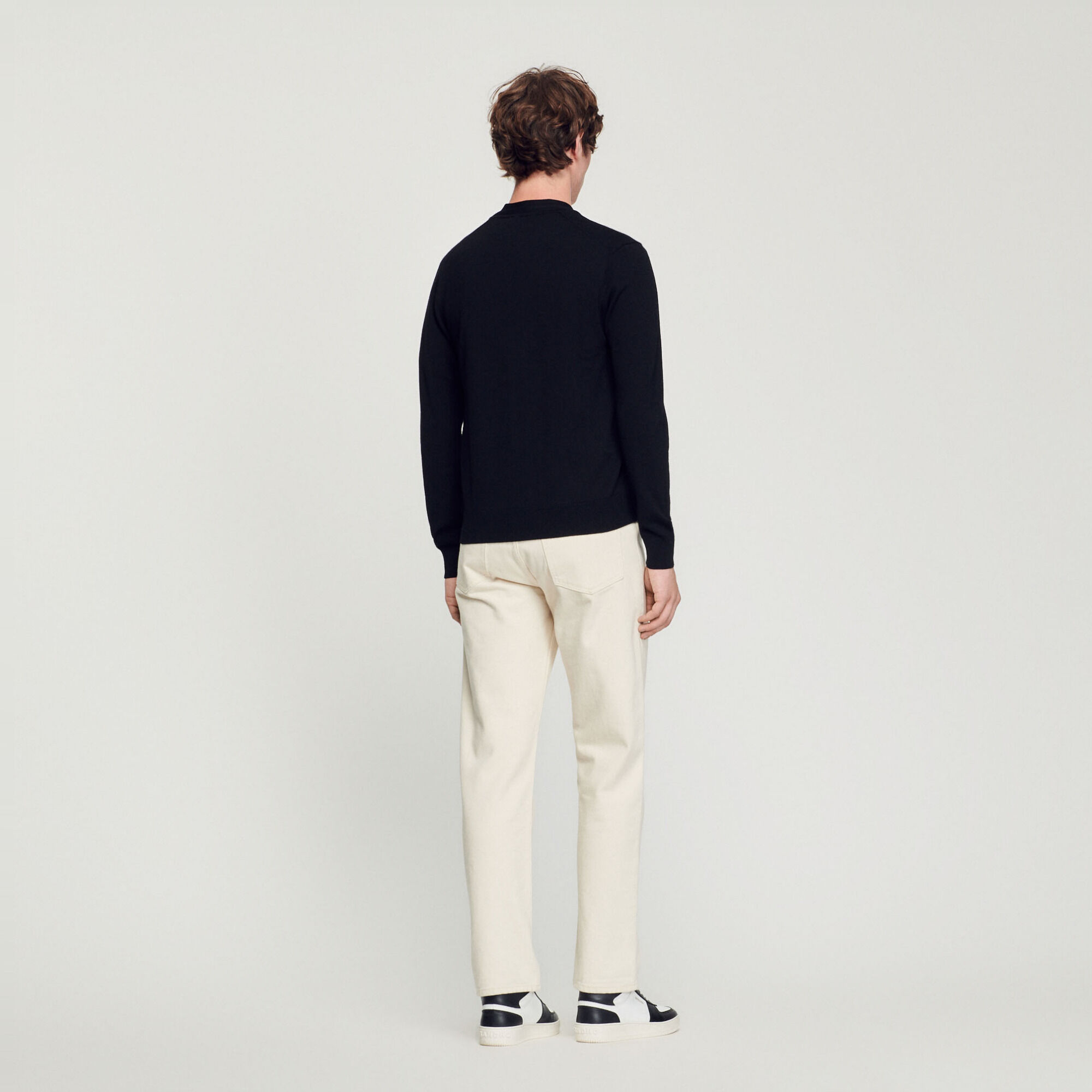 Wool cardigan with S patch