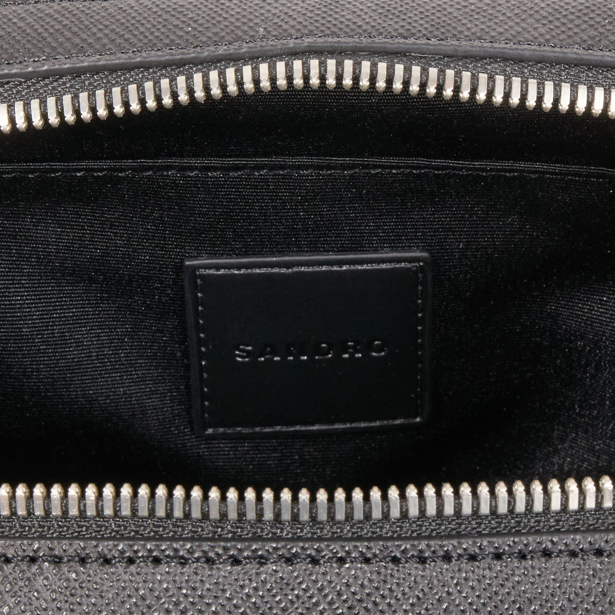Small reconstitued leather bag