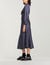 Long flowing dress with polka-dot print