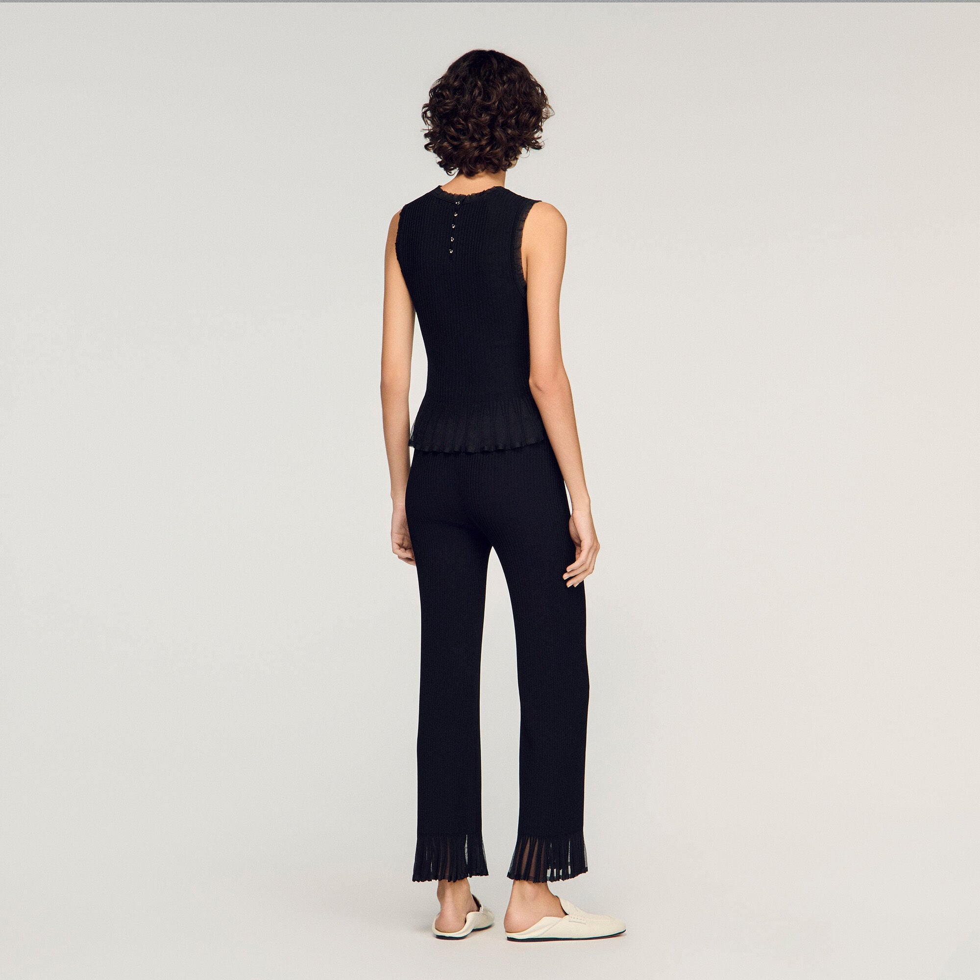 Ruffled knit trousers