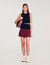 Short two-tone pleated skirt