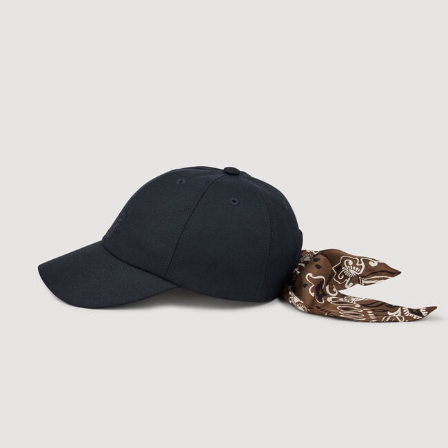 Cap with tied scarf