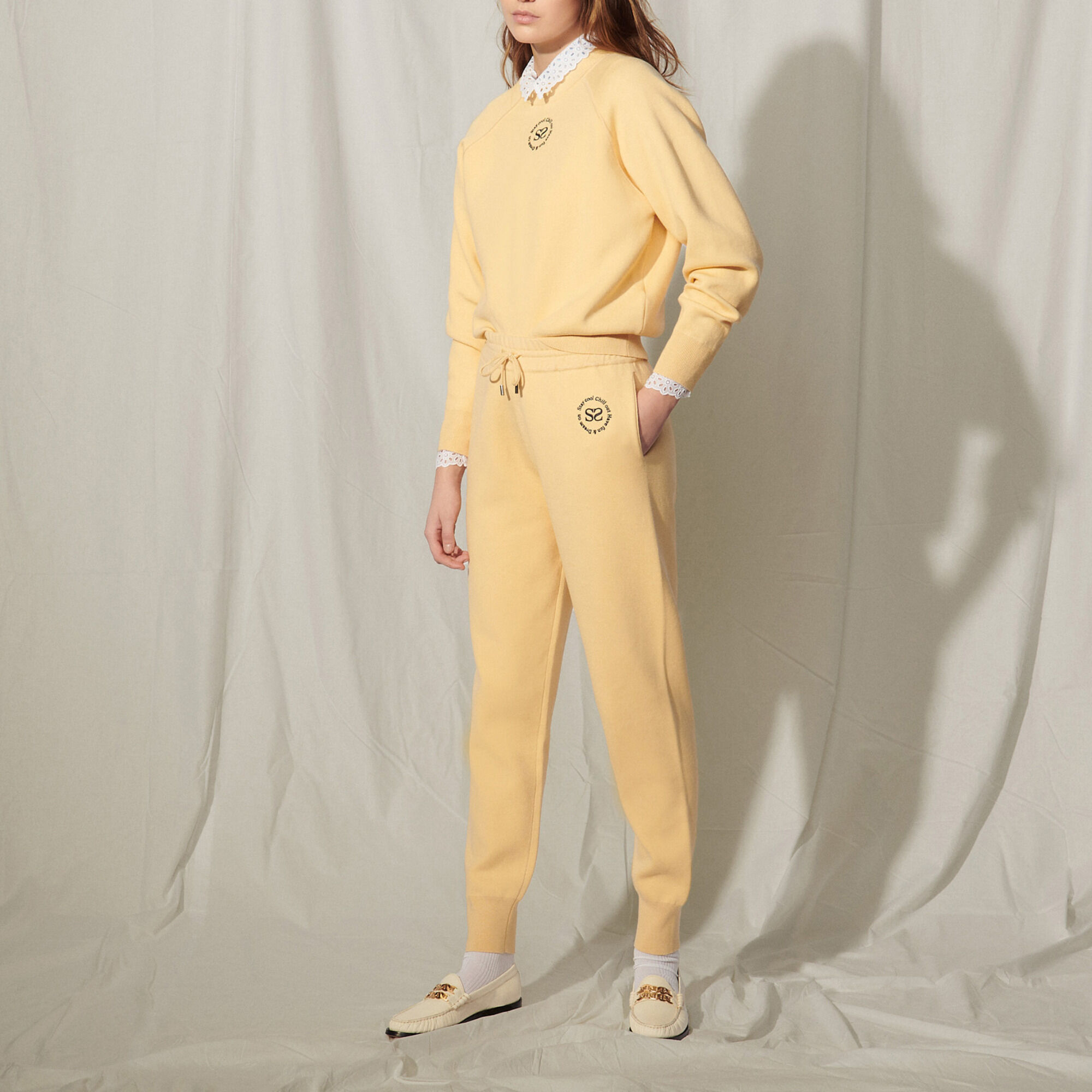 Sandro Knit jogging bottoms with embroidery Select a size and