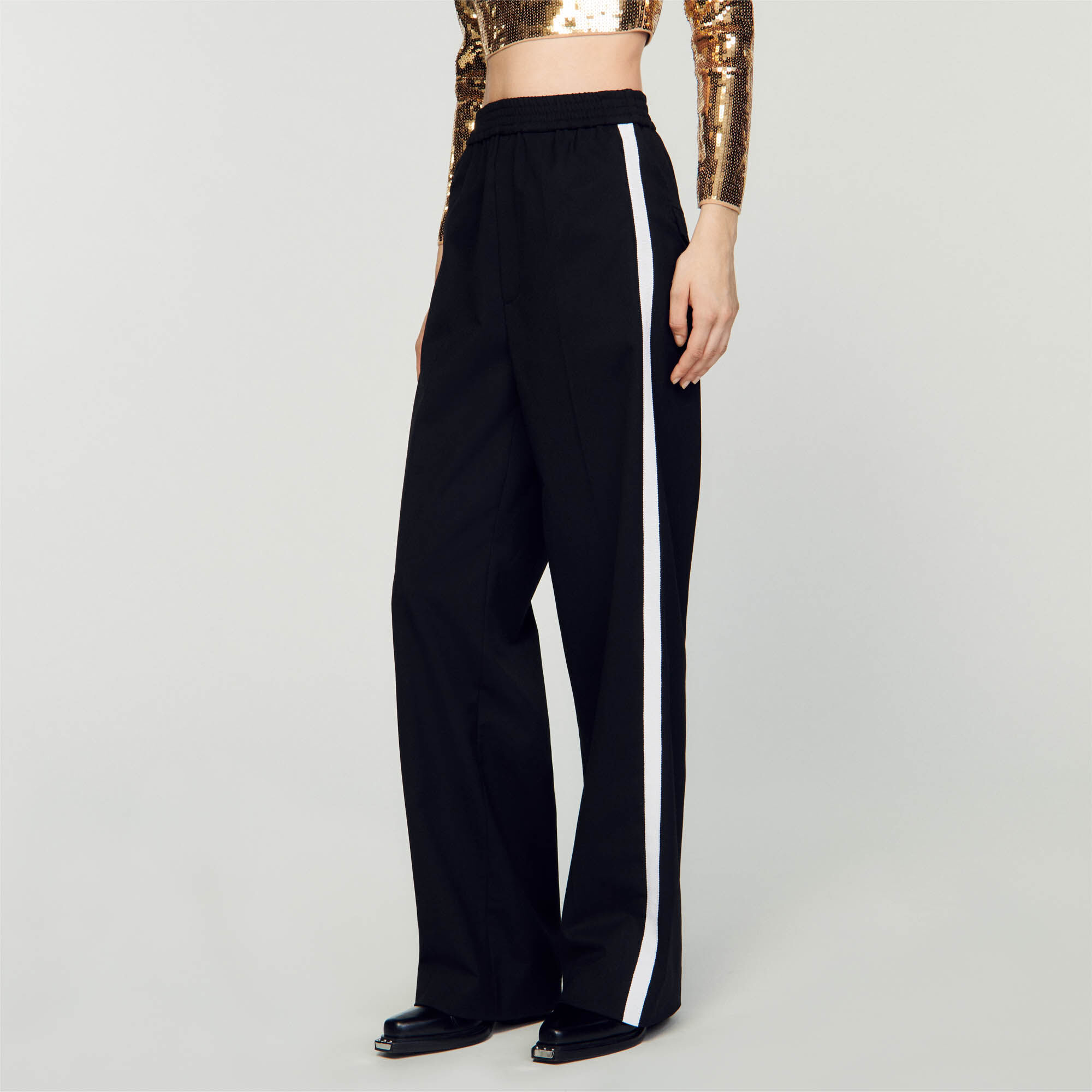 Trousers with discount stripe down side