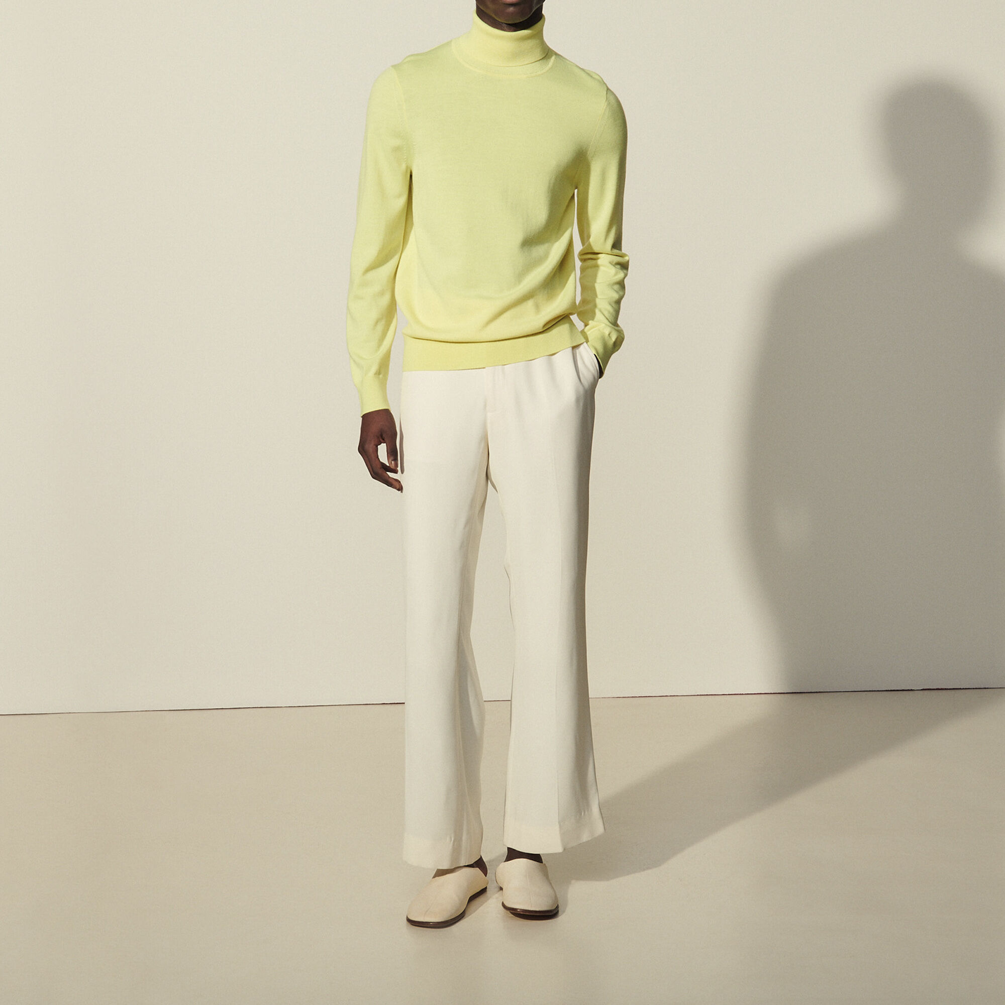 Sandro Roll Neck Wool Sweater In Yellow